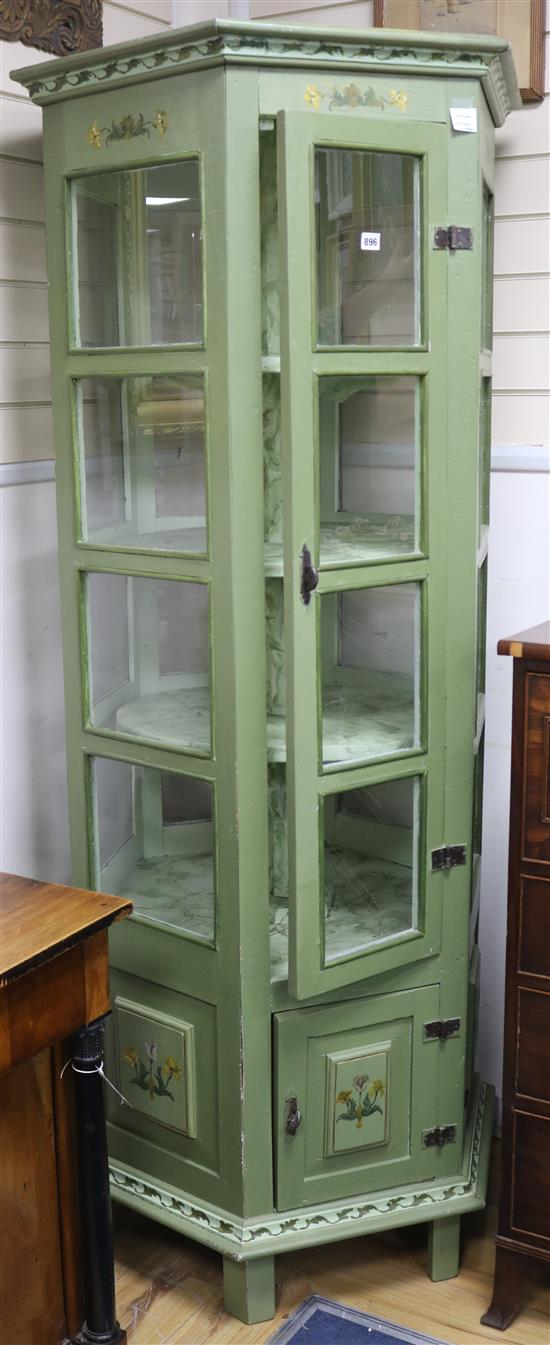 A green and floral painted pentagonal display cabinet W.86cm
